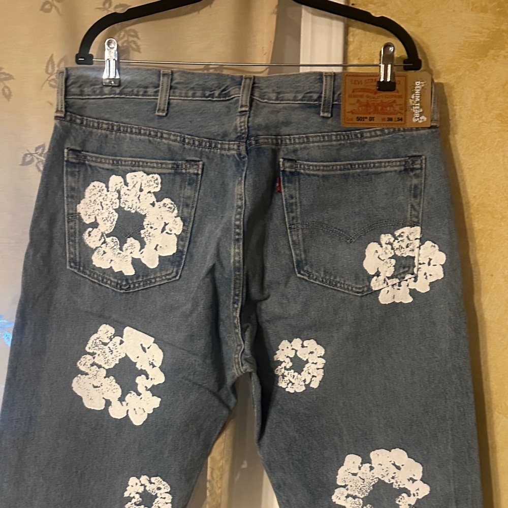 Levi's Denim  Tears Jeans with White Floral Accents new unworn